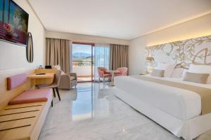 Postel nebo postele na pokoji v ubytování Hotel Servigroup Montíboli