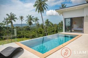 einen Pool in einer Villa mit Aussicht in der Unterkunft Villa Toi&Moi 3Br Private Pool Sea View in Ban Thung