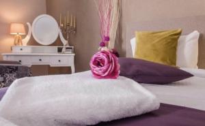 Uma cama ou camas num quarto em Hotel Garni Ideal