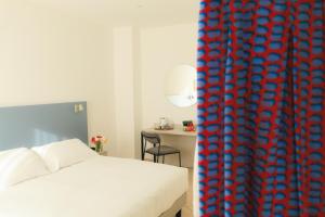Voodi või voodid majutusasutuse Albergo Sappia toas