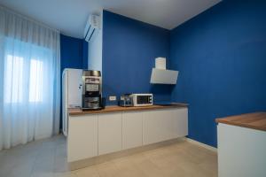 Kuchyň nebo kuchyňský kout v ubytování Hotel Aldebaran
