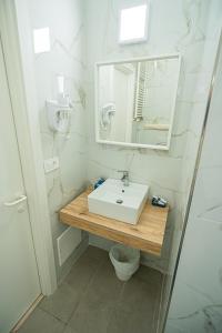 Koupelna v ubytování Hotel Aldebaran