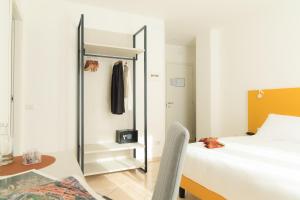 Voodi või voodid majutusasutuse Albergo Sappia toas