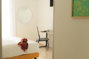 Voodi või voodid majutusasutuse Albergo Sappia toas