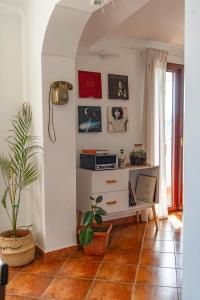 TV a/nebo společenská místnost v ubytování Coliving Together Gargano