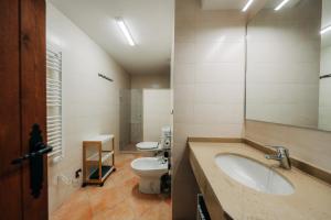 a bathroom with a sink and a toilet at Alojamiento rural la Mola 11 in Benasal +23 photos