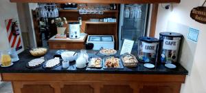 a counter with some food on top of it at La Glorieta in Federación