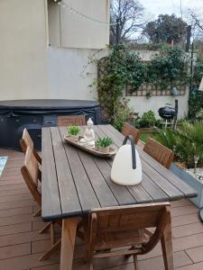 Zahrada ubytování Maison climatisée avec jaccuzi
