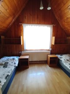 Postel nebo postele na pokoji v ubytování Chata Žiar