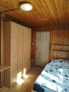 Postel nebo postele na pokoji v ubytování Chata Žiar