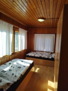 Postel nebo postele na pokoji v ubytování Chata Žiar