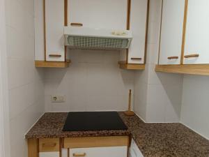 A kitchen or kitchenette at BRAVAHOLIDAYS-250-Poblet