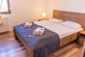 Кровать или кровати в номере MWellness Apartment