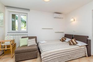 Postel nebo postele na pokoji v ubytování Holiday house TRSJA