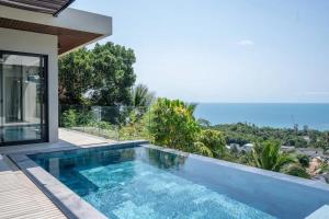 Bazén v ubytování Villa Malo 3br Infinity Pool & Panoramic Sea View nebo v jeho okolí