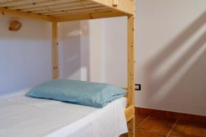 Voodi või voodid majutusasutuse Coliving Together Gargano toas
