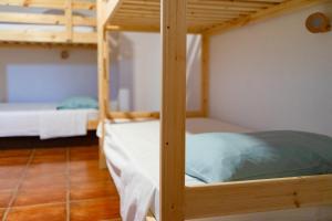 Voodi või voodid majutusasutuse Coliving Together Gargano toas