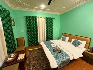 Katil atau katil-katil dalam bilik di Faizzy residency