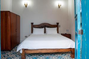 Ένα ή περισσότερα κρεβάτια σε δωμάτιο στο La Casa de Isa