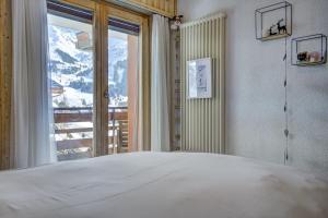 Postel nebo postele na pokoji v ubytování Boucanier