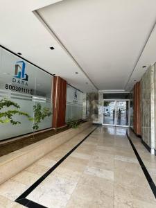 a lobby of a building with a sign on the wall at شقه مفروشة ببطحاء قريش in An Nikāshah