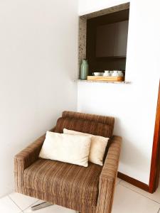 Cobertura com Banheira e Cama King的休息区