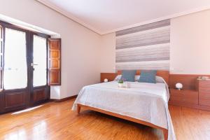 Ένα ή περισσότερα κρεβάτια σε δωμάτιο στο Amplio y soleado apartamento en Escalante