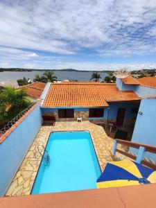 Kolam renang di atau dekat dengan Casa em Fama com vista para represa!