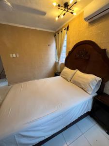 Postel nebo postele na pokoji v ubytování Casa Cipreses Valladolid
