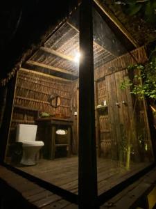 an outside view of a bathroom with a toilet at Loft Vidro Pirâmide Rota do Vinho São Roque in São Roque +96 photos