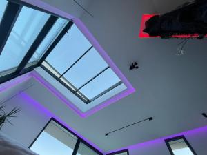 an overhead view of a ceiling with a window at Suite impériale LOVE ROOM in Sisteron