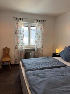 Ένα ή περισσότερα κρεβάτια σε δωμάτιο στο Wohnung `Bergblick`, 2 Zi, 4 Pers, EG mit Terrasse