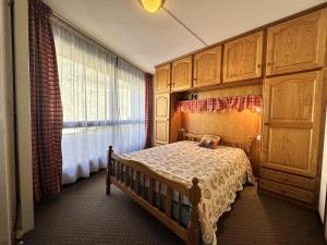 Posteľ alebo postele v izbe v ubytovaní Résidence Les Arolles - Spacieux deux pièces pied des pistes MAE-0484