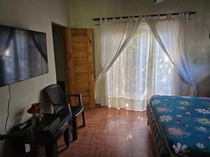 TV a/nebo společenská místnost v ubytování Hacienda Claro de Luna 3 Bedrooms