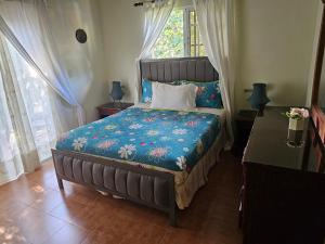 Postel nebo postele na pokoji v ubytování Hacienda Claro de Luna 3 Bedrooms