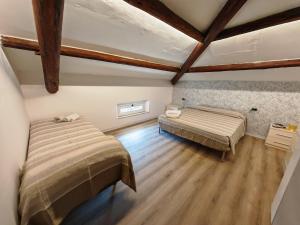 Ένα ή περισσότερα κρεβάτια σε δωμάτιο στο Appartamento estivo GARBINO - Misano Adriatico -RN-