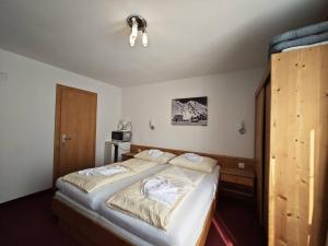 Ένα ή περισσότερα κρεβάτια σε δωμάτιο στο Bella Mira