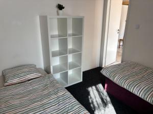 Rúm í herbergi á Ubytování Hoštka