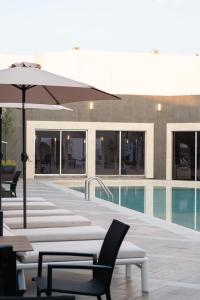 Bazén v ubytování Courtyard by Marriott Puebla Las Animas nebo v jeho okolí