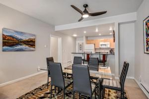 a dining room with a table and chairs at Winter Getaway in the Rockies in Avon