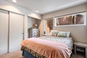 a bedroom with a bed and a window at Family Vacation Home Hot Tub Pool Free Village Bus in Vail +15 photos