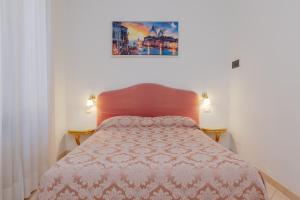 Posteľ alebo postele v izbe v ubytovaní Hotel Marte