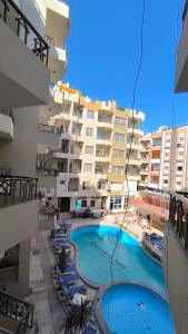 a large swimming pool in the middle of a building at Paradise Hill in Hurghada