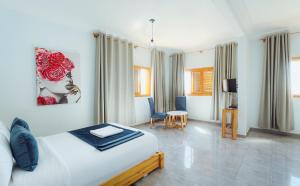 Postel nebo postele na pokoji v ubytování Fyndy Hotel Dakhla