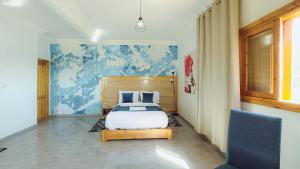 Postel nebo postele na pokoji v ubytování Fyndy Hotel Dakhla