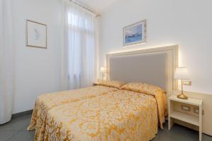 Posteľ alebo postele v izbe v ubytovaní Hotel Marte