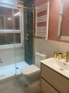 Kúpeľňa v ubytovaní OLYMPIC VILLAGE