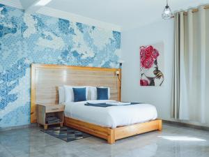 Postel nebo postele na pokoji v ubytování Fyndy Hotel Dakhla