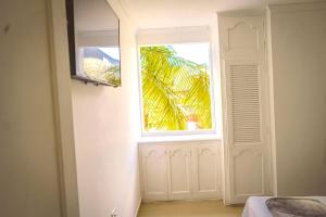 Et tv og/eller underholdning på Comodo apartamento 2-2 - Parqueo cubierto para 1 carro - En el corazón de Guatape