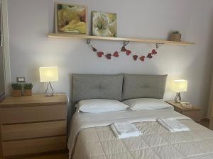 Postel nebo postele na pokoji v ubytování Clara house
